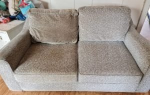 What is the best way to clean fabric upholstery? 